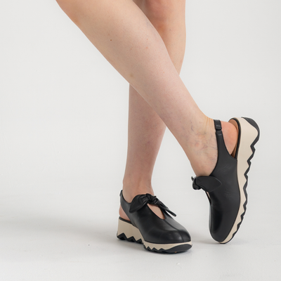 Claudia Black Leather Wedges