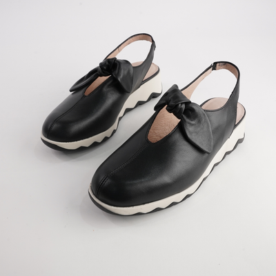 Claudia Black Leather Wedges