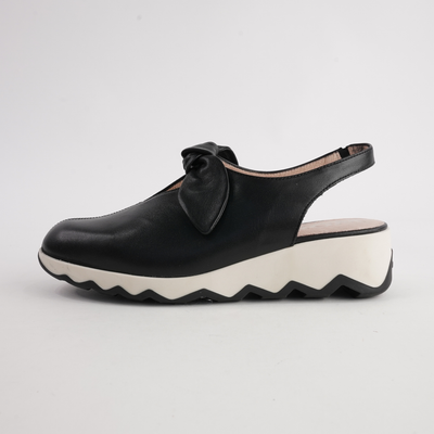 Claudia Black Leather Wedges