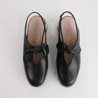 Claudia Black Leather Wedges